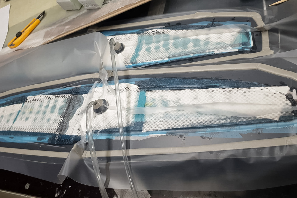 Vacuum bagging sandwich structure